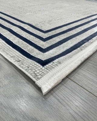 Hera Frame Patterned Machine Made Carpet Blue